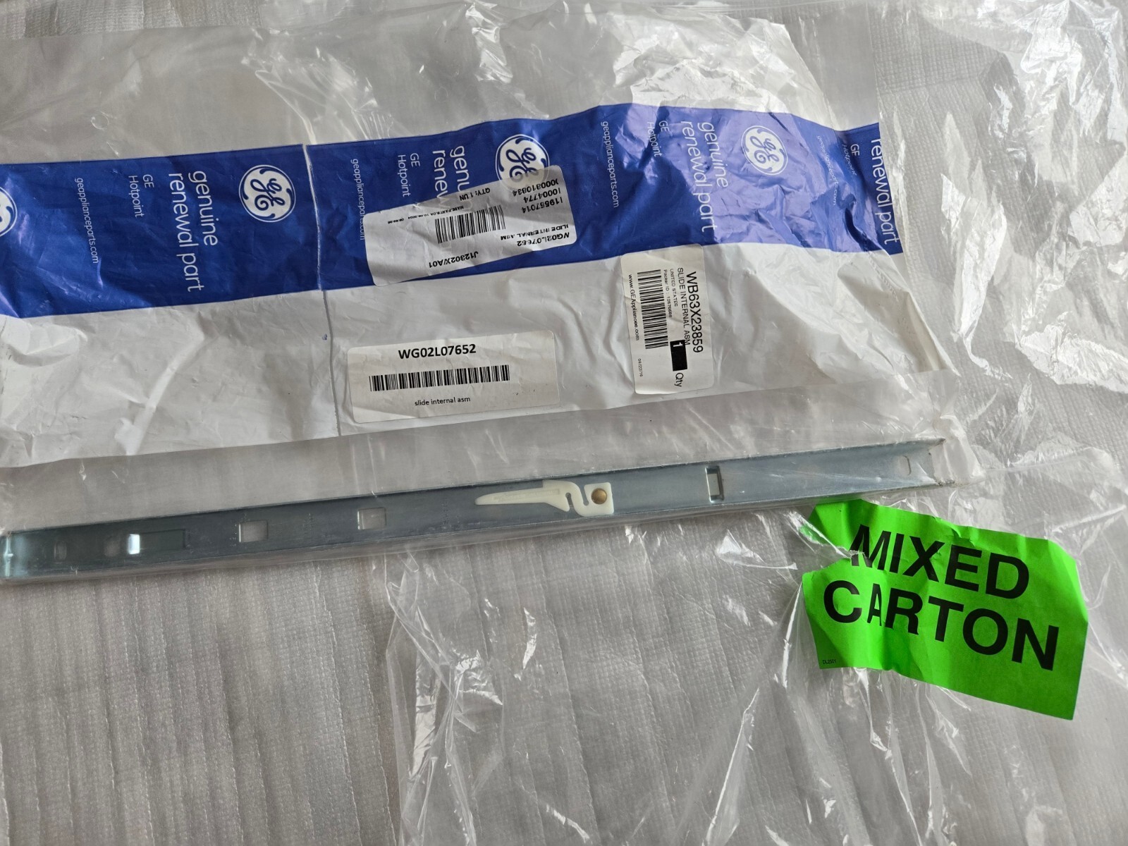 Genuine General Electric GE Slider Internal Assy P/N WB63X23859